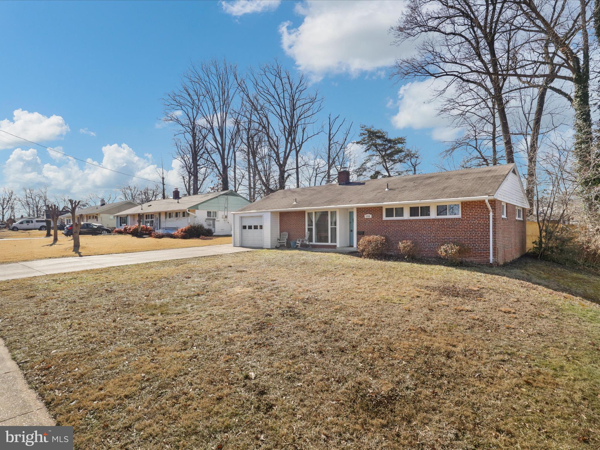 5908 Hanover Avenue Springfield, VA 22150 - Photo 30 of 32 a front view of house with yard and trees