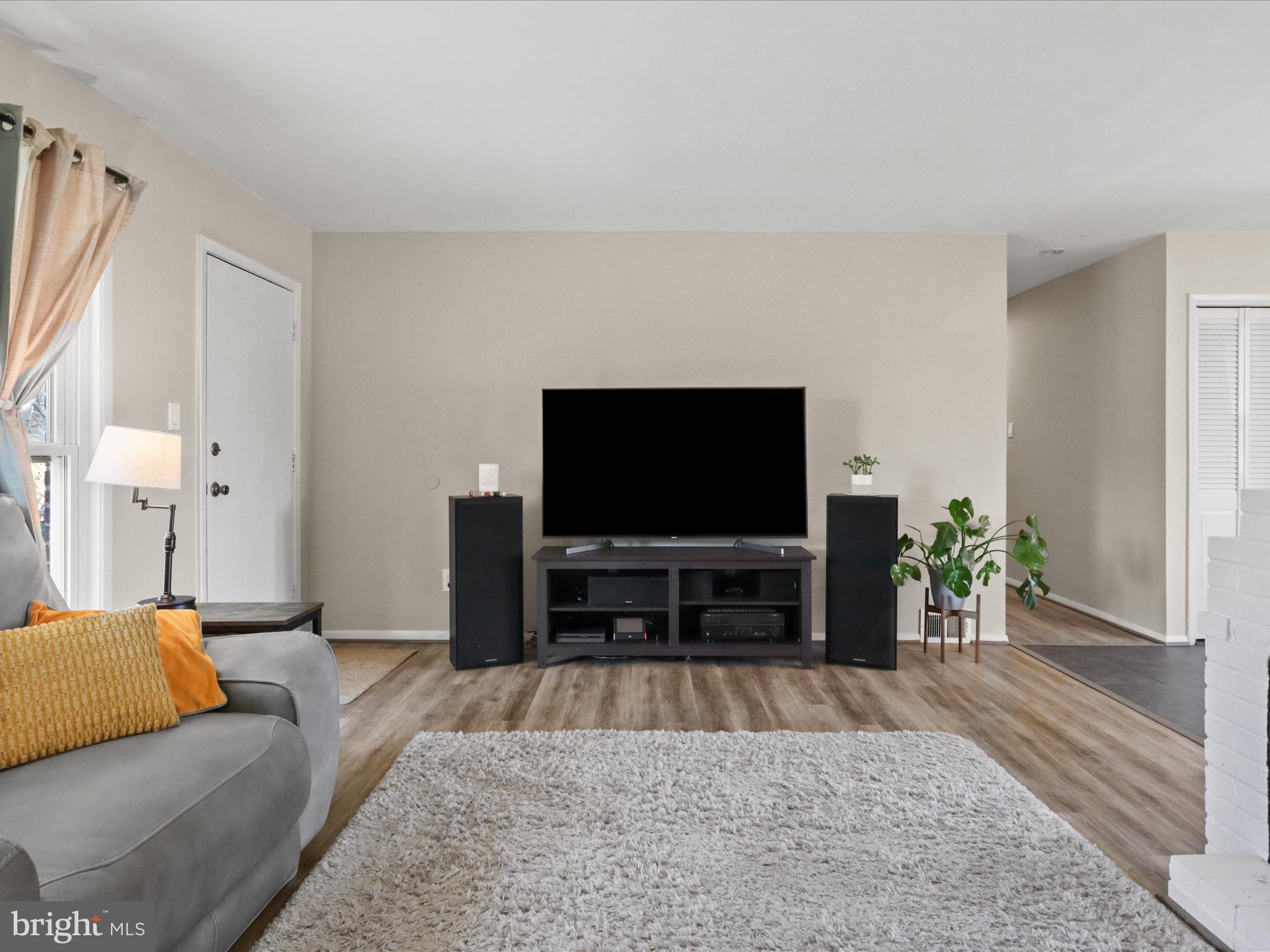 5908 Hanover Avenue Springfield, VA 22150 - Photo 10 of 32 a living room with furniture and a flat screen tv