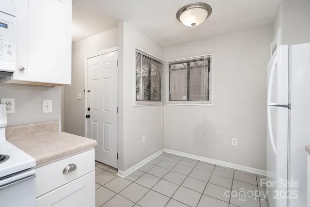 a bathroom with a sink vanity and a mirror