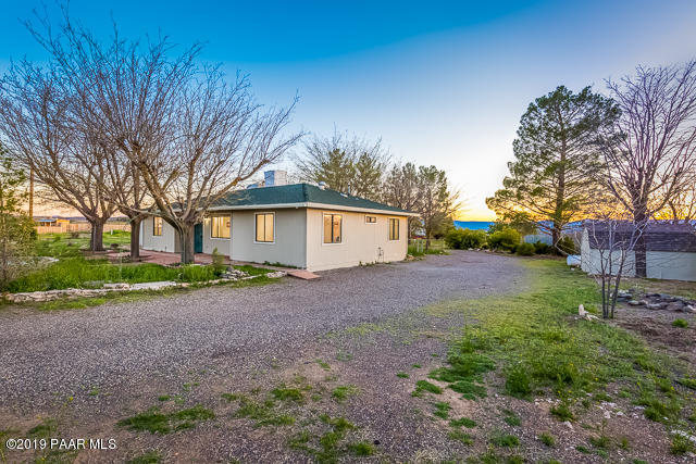5240 Albatross Road Rimrock, AZ 86335 - Photo 1 of 1 a view of a house with backyard and trees