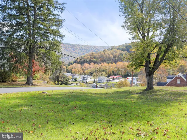 a view of storage and utility room with a window