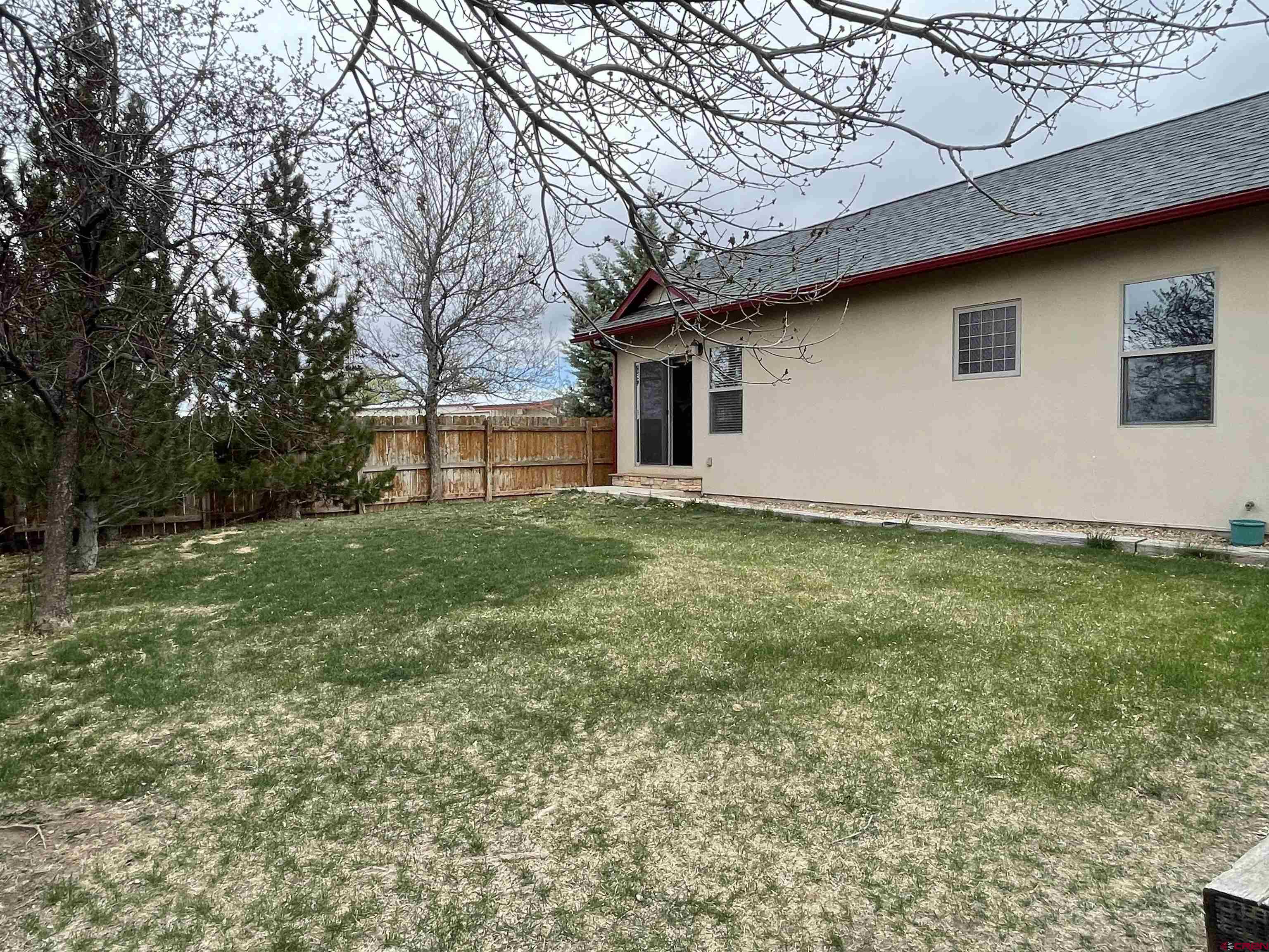 2271 Par Drive Cortez, CO 81321 - Photo 28 of 36 a white house that has tree in front of it