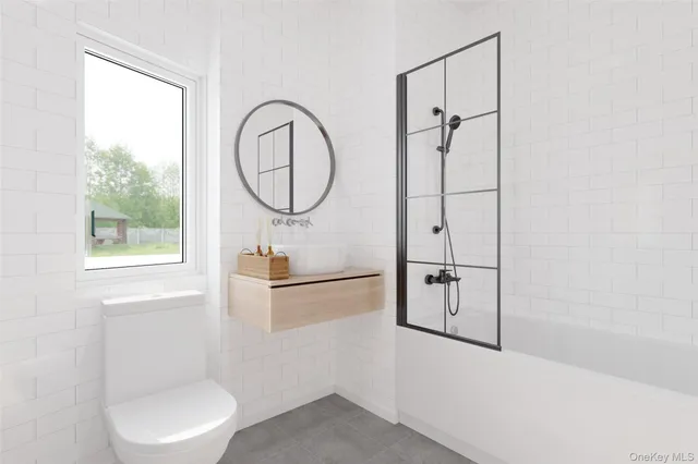 a bathroom with a toilet a sink and a window