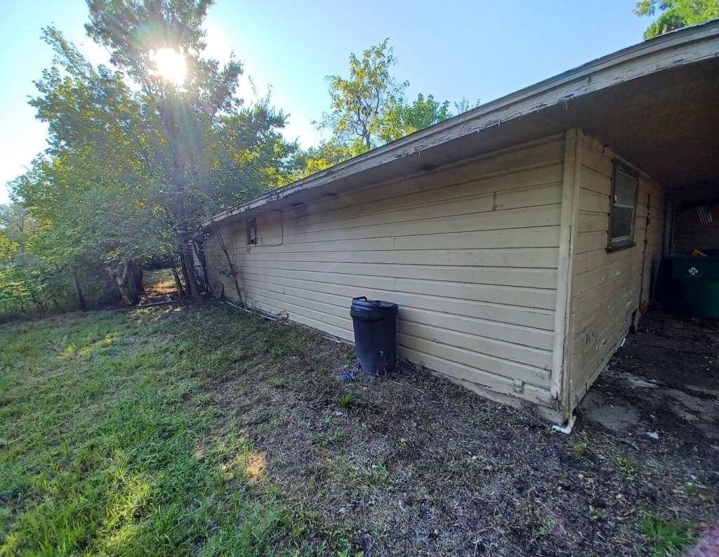 617 Grayson Street Pottsboro, TX 75076 - Photo 3 of 6 a view of a backyard