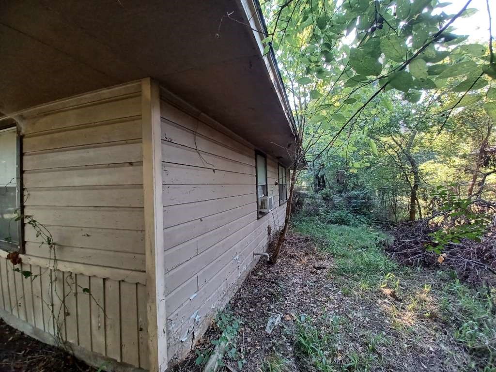 617 Grayson Street Pottsboro, TX 75076 - Photo 4 of 6 a backyard of a house with lots of green space