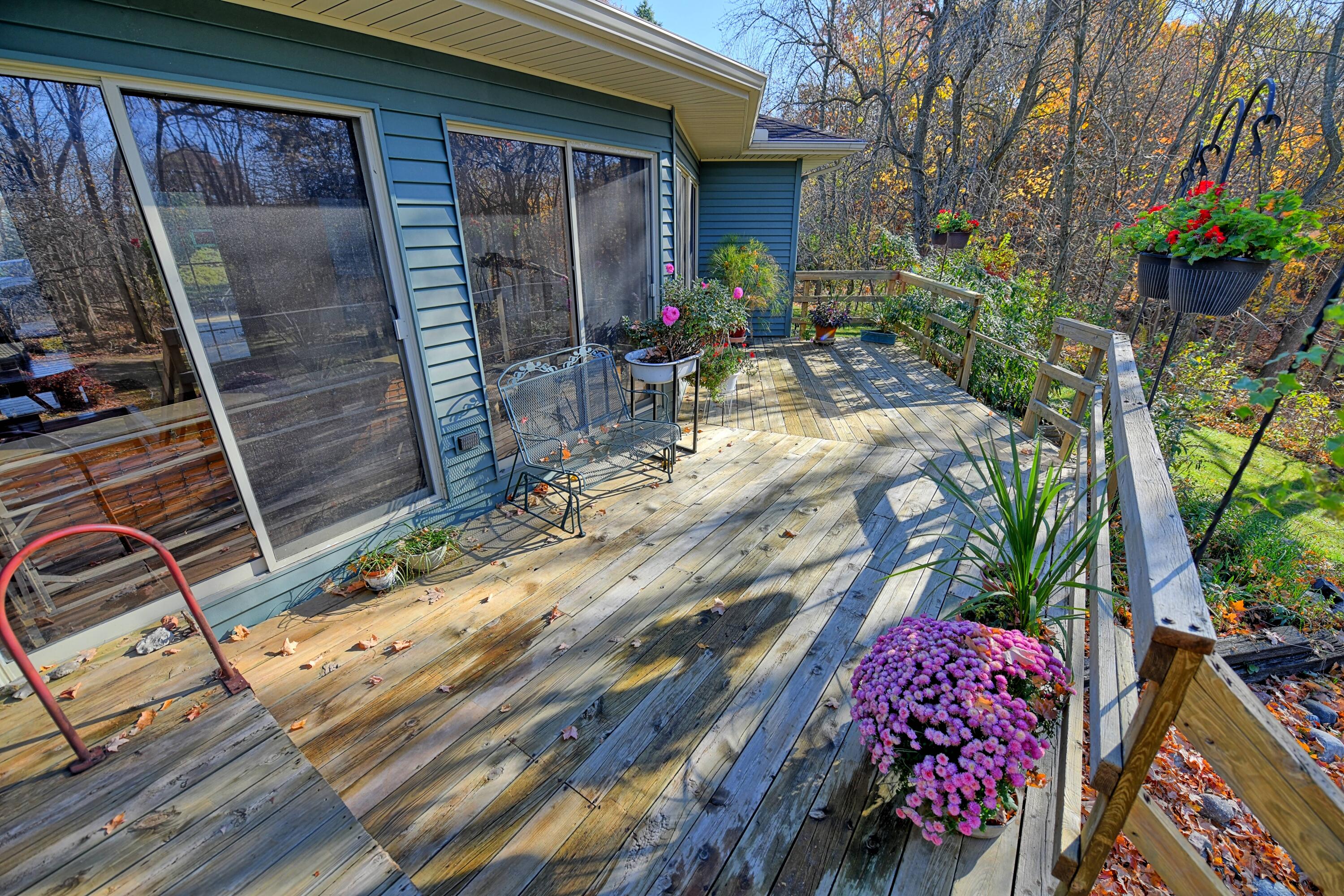 15027 West Cutler Road Eagle, MI 48822 - Photo 36 of 65 Wrap around deck