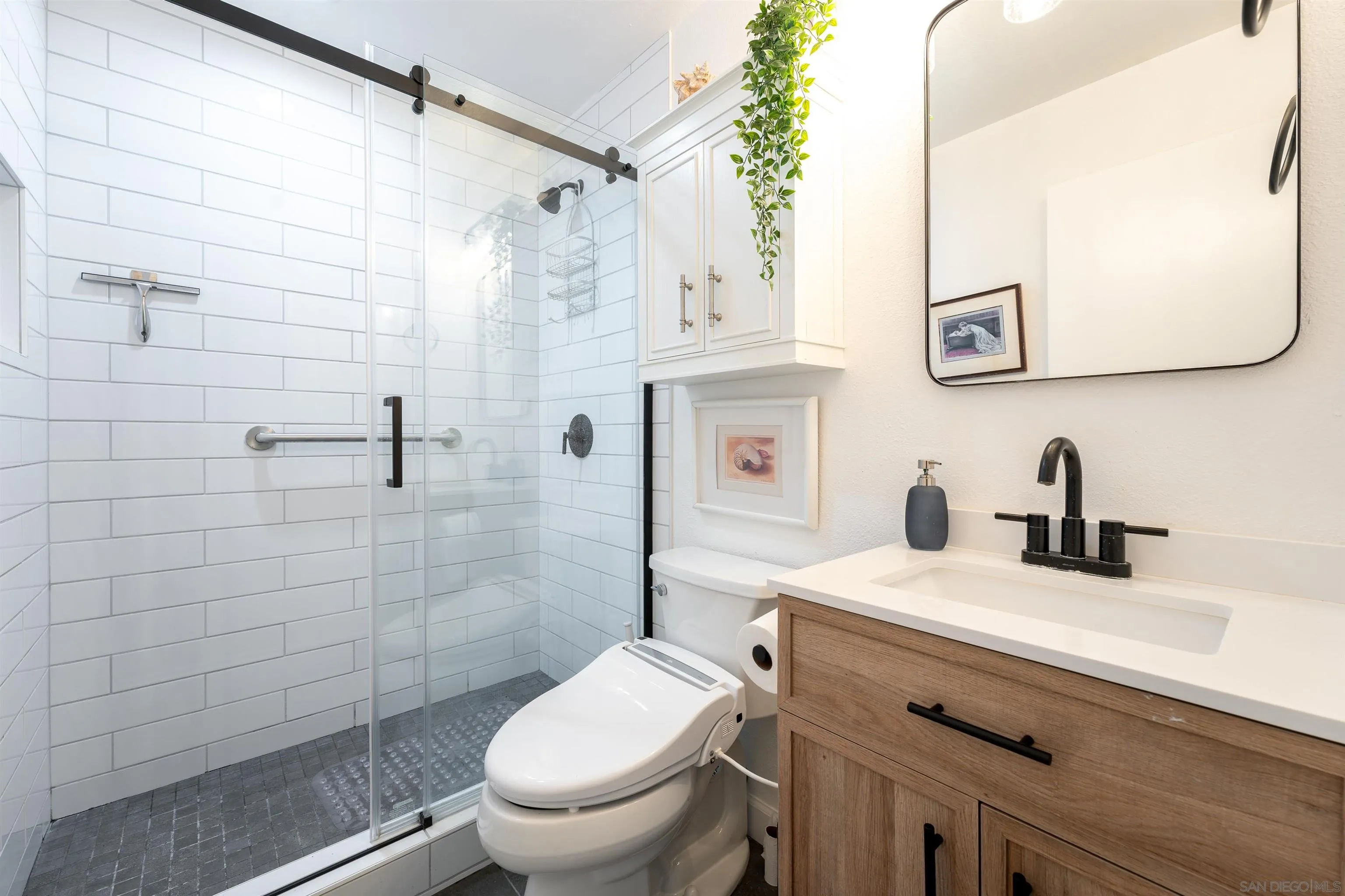 346 Abington Road Encinitas, CA 92024 - Photo 12 of 33 a bathroom with a sink a toilet and shower