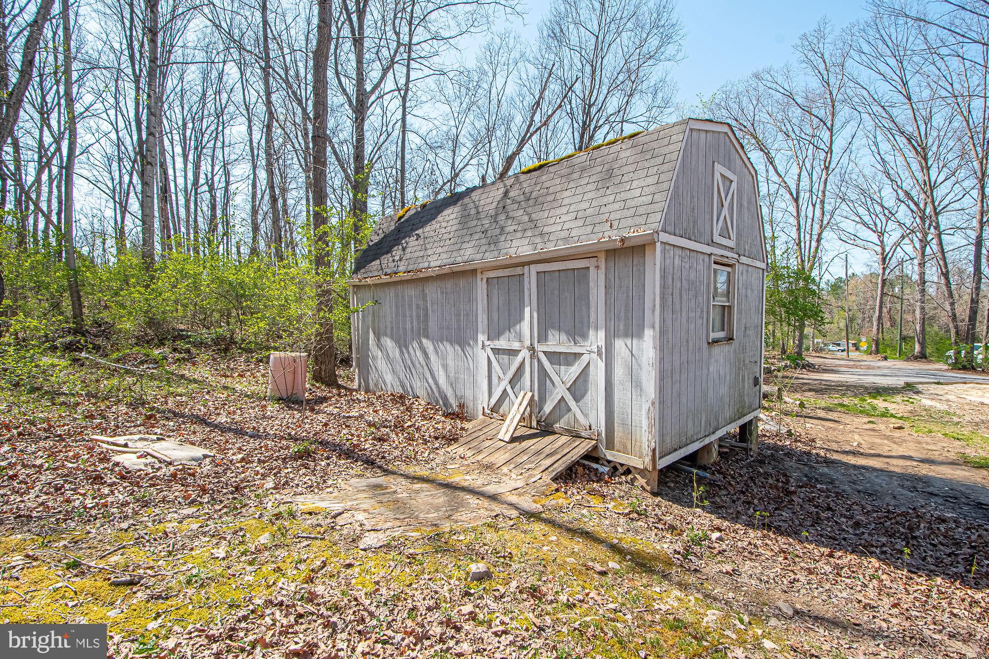 4792 Howellsville Road Front Royal, VA 22630 - Photo 13 of 41 a house with trees in the background
