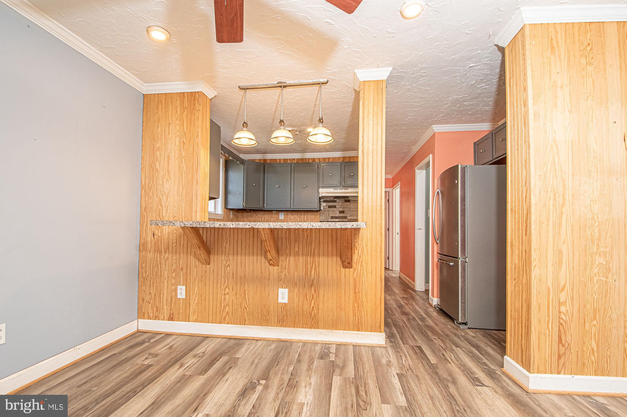 4792 Howellsville Road Front Royal, VA 22630 - Photo 20 of 41 a view of a room with wooden floor and cabinet
