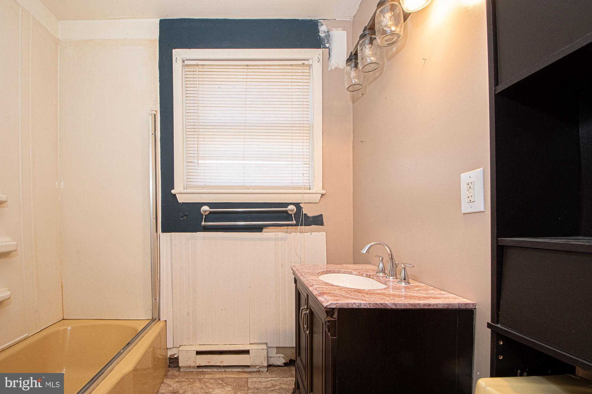 4792 Howellsville Road Front Royal, VA 22630 - Photo 27 of 41 a bathroom with a sink and a tub