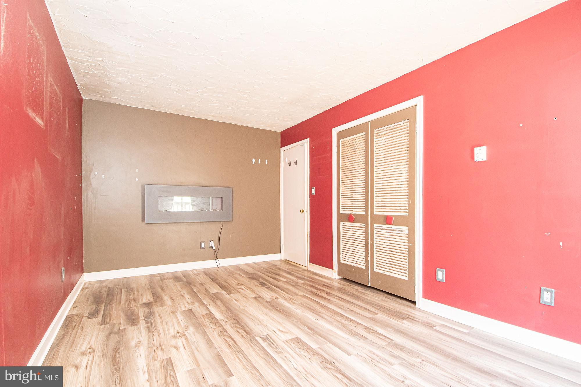 4792 Howellsville Road Front Royal, VA 22630 - Photo 32 of 41 a bedroom with a bed and a window