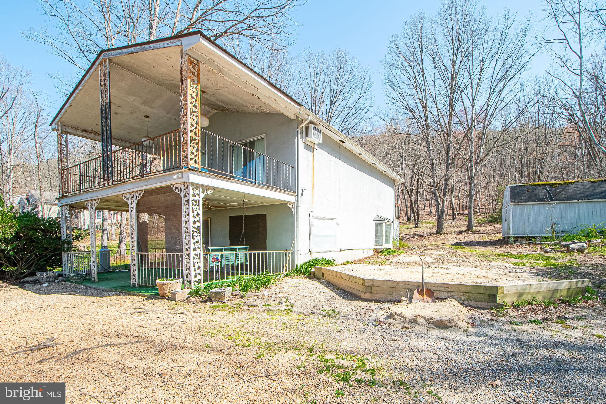 4792 Howellsville Road Front Royal, VA 22630 - Photo 38 of 41 a view of a house with snow on the road