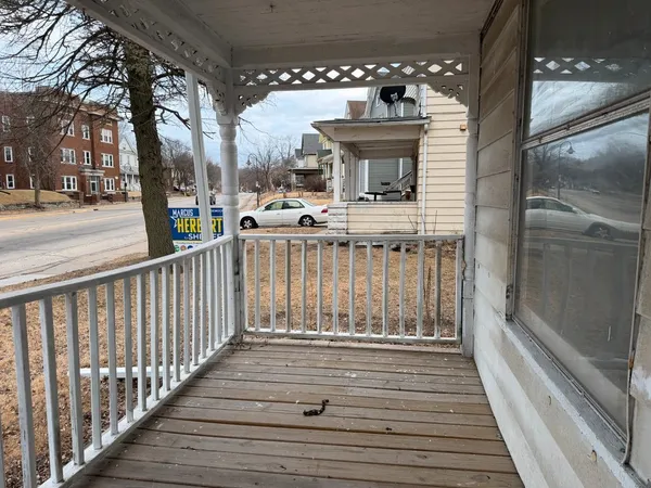 a view of a house with a porch