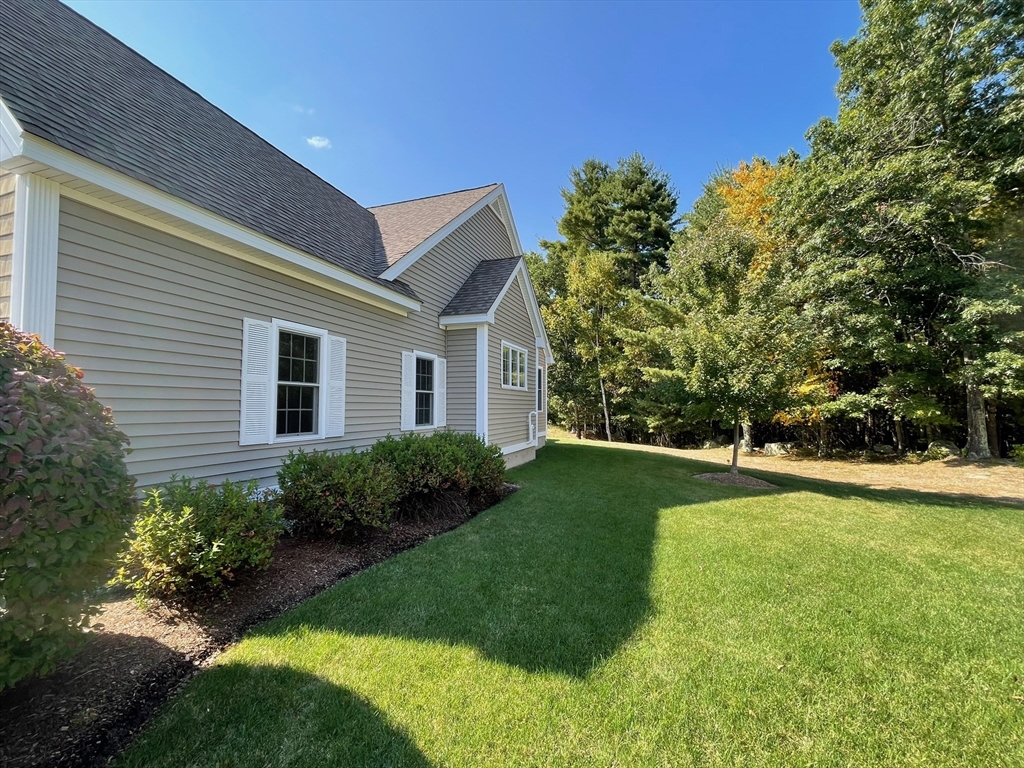 7 Sandstone Road Westford, MA 01886 - Photo 2 of 29 a view of a house with a backyard