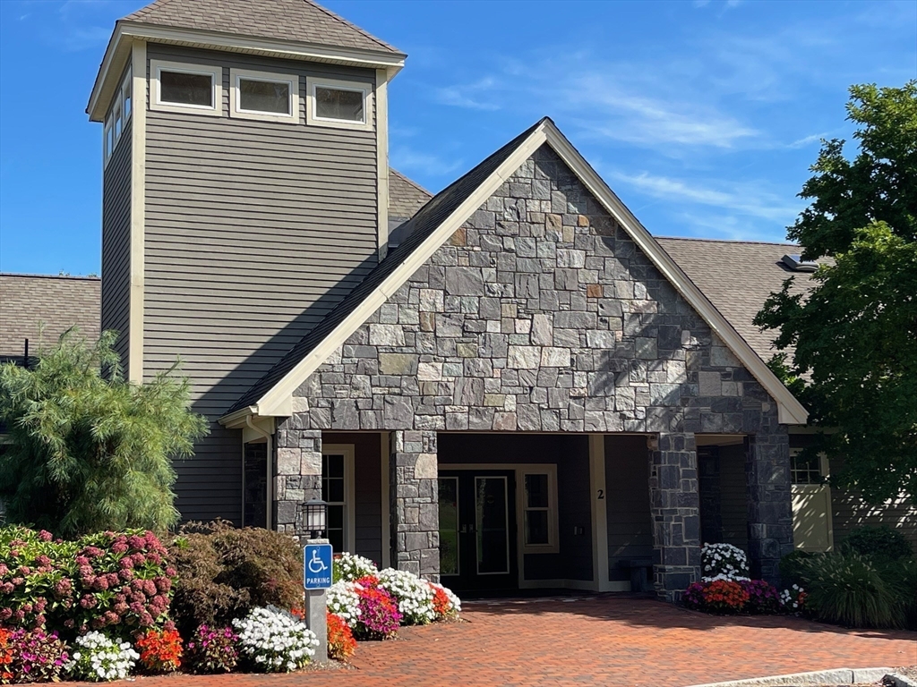 7 Sandstone Road Westford, MA 01886 - Photo 29 of 29 a front view of a house with a yard
