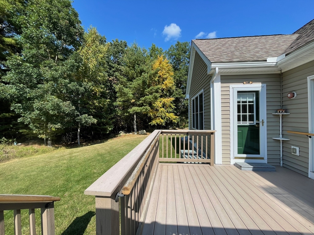 7 Sandstone Road Westford, MA 01886 - Photo 4 of 29 a view of backyard with deck and outdoor seating