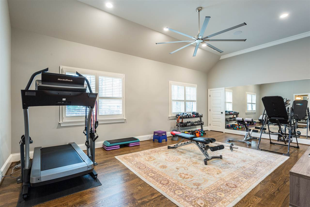 5108 Bella Ridge Drive Raleigh, NC 27615 - Photo 27 of 29 This spacious bedroom has a private bath with a tub/shower combination. If a buyer wants to splits this large room into 2 rooms, it is possible as during construction addition doors were framed behind sheetrock for future use. Bedroom 4- Currently used as Exercise Room