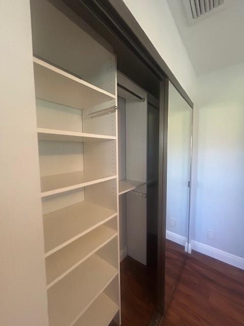 2821 Southeast 5th Circle Boynton Beach, FL 33435 - Photo 23 of 38 a view of walk in closet with empty racks