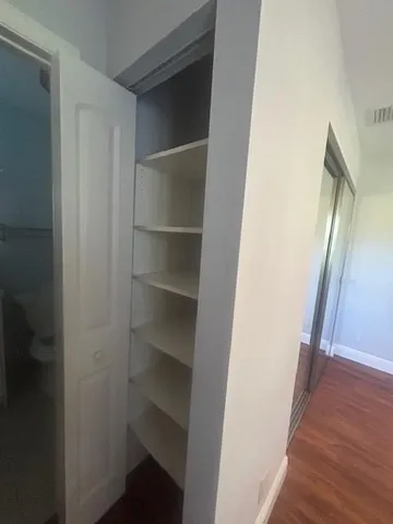 a view of a backyard with sitting area