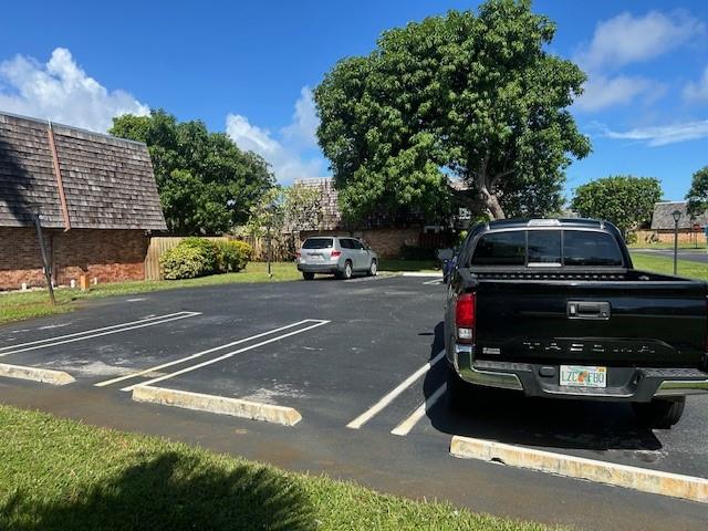 2821 Southeast 5th Circle Boynton Beach, FL 33435 - Photo 3 of 38 a car parked on the side of the road