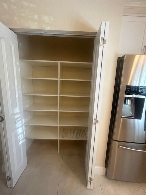 2821 Southeast 5th Circle Boynton Beach, FL 33435 - Photo 10 of 38 a view of walk in closet with empty racks