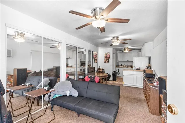 an aerial view of a house with outdoor space