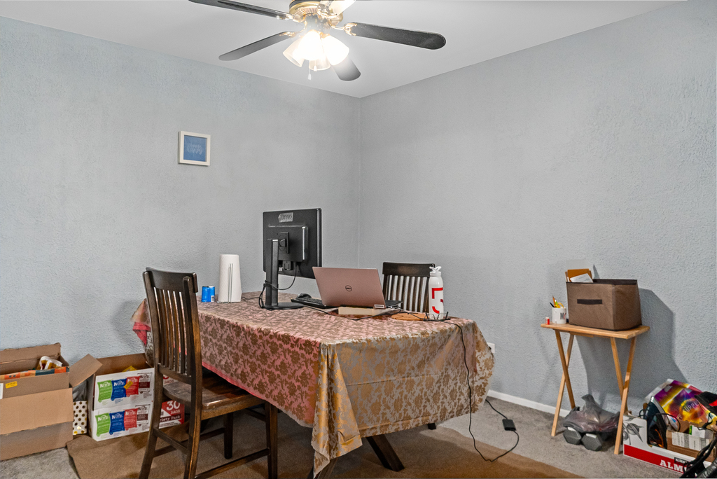 9001 Golf Road, Unit 4D Des Plaines, IL 60016 - Photo 7 of 15 a bedroom with a bed and wooden floor