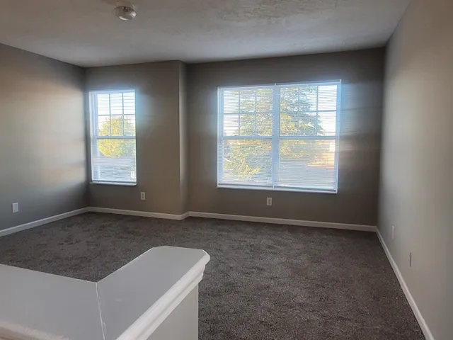 an empty room with windows