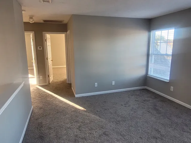an empty room with windows