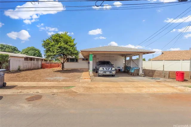 a view of a house with basketball court