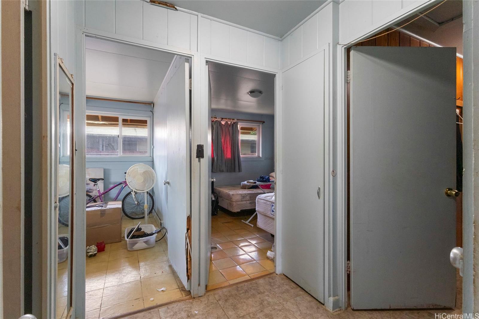 1238 Molehu Drive Honolulu, HI 96818 - Photo 13 of 25 a view of a hallway with closet and a livingroom view