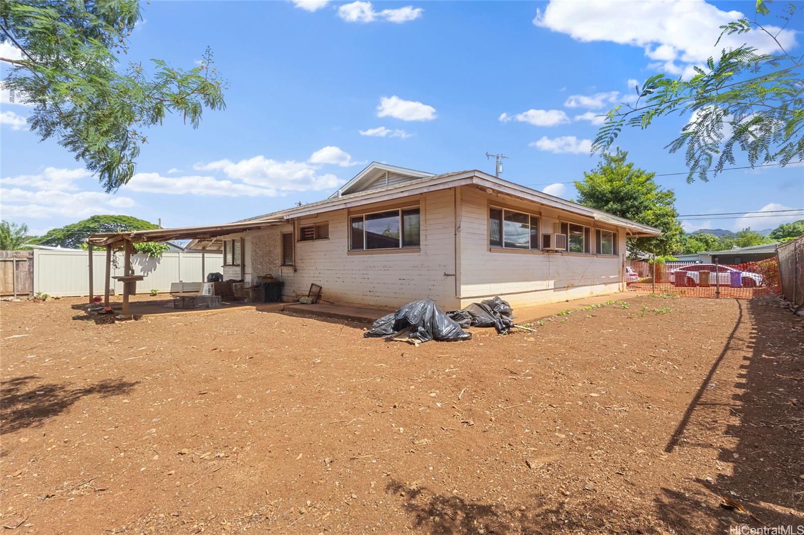 1238 Molehu Drive Honolulu, HI 96818 - Photo 22 of 25 a view of a house with a patio
