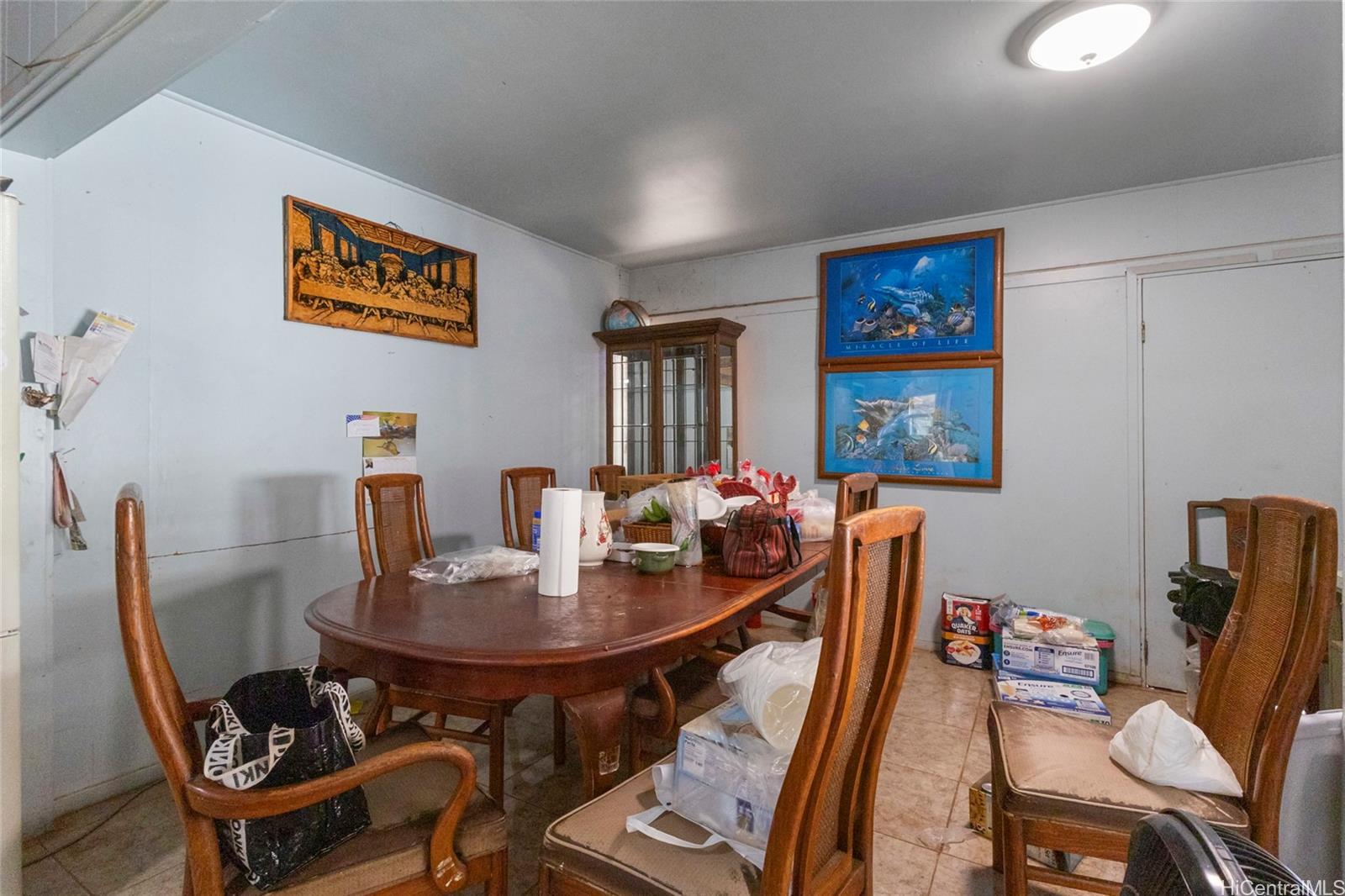 1238 Molehu Drive Honolulu, HI 96818 - Photo 9 of 25 a dining room with furniture and wooden floor