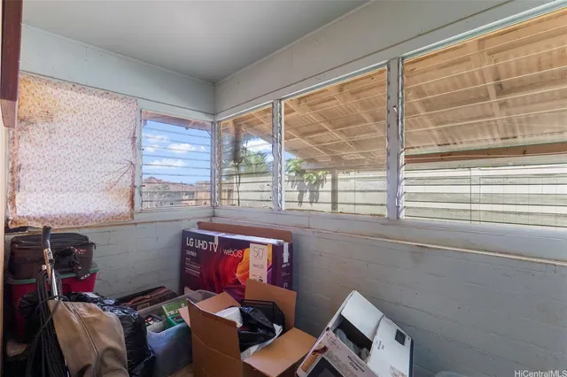 a room with furniture and a window