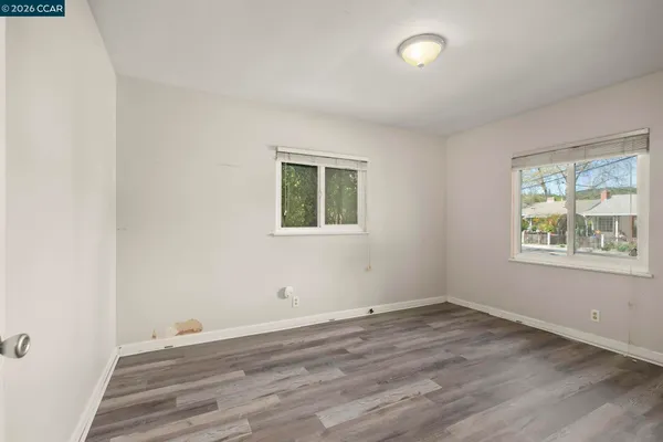 a bathroom with a toilet and a bathtub