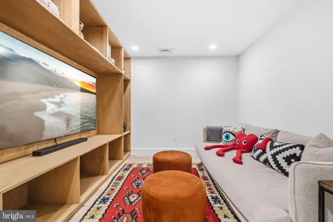 a living room with furniture and a couch