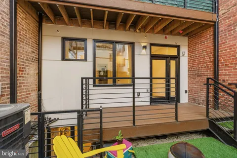 a house with outdoor seating