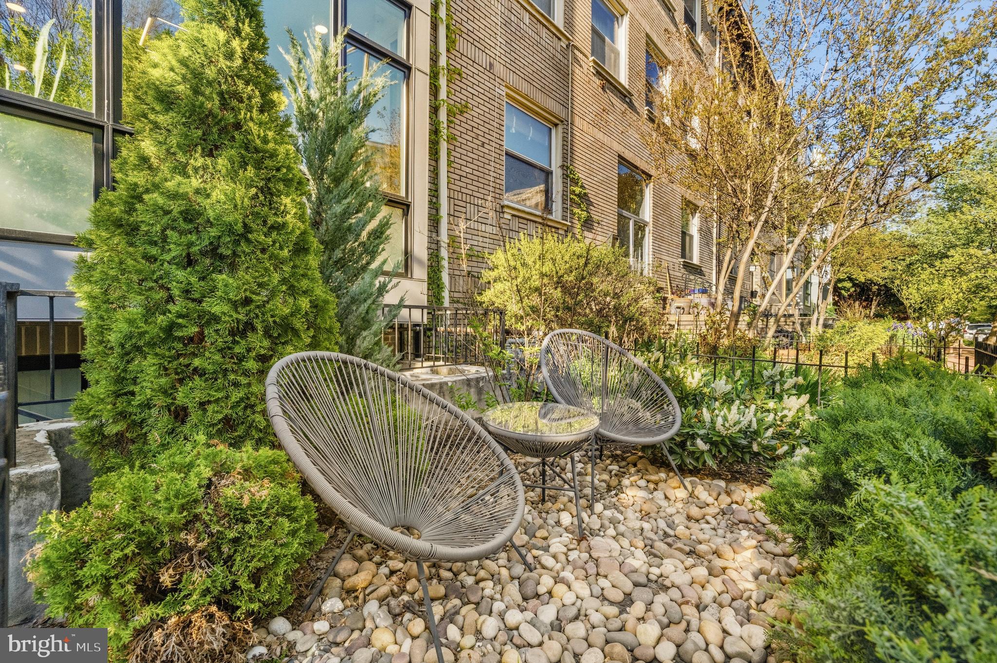 1729 T Street Northwest, Unit 3 Washington, DC 20009 - Photo 34 of 38 a view of a chair and table in the patio