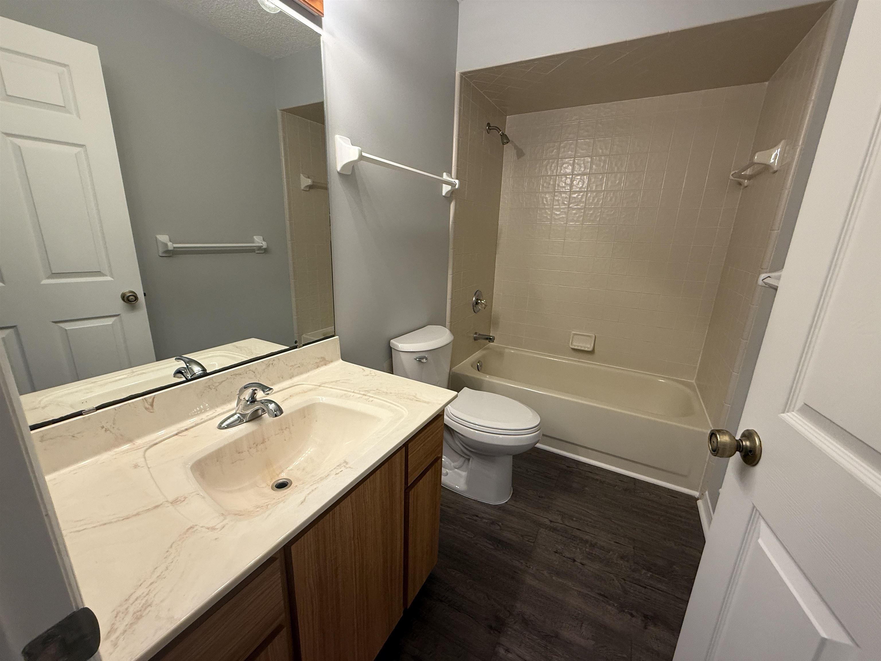 997 Irma Way St. Augustine, FL 32086 - Photo 5 of 10 a bathroom with a sink toilet and shower