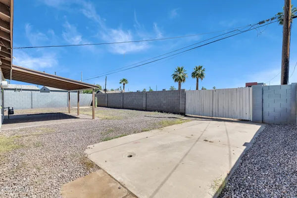 a view of a house with wooden wall