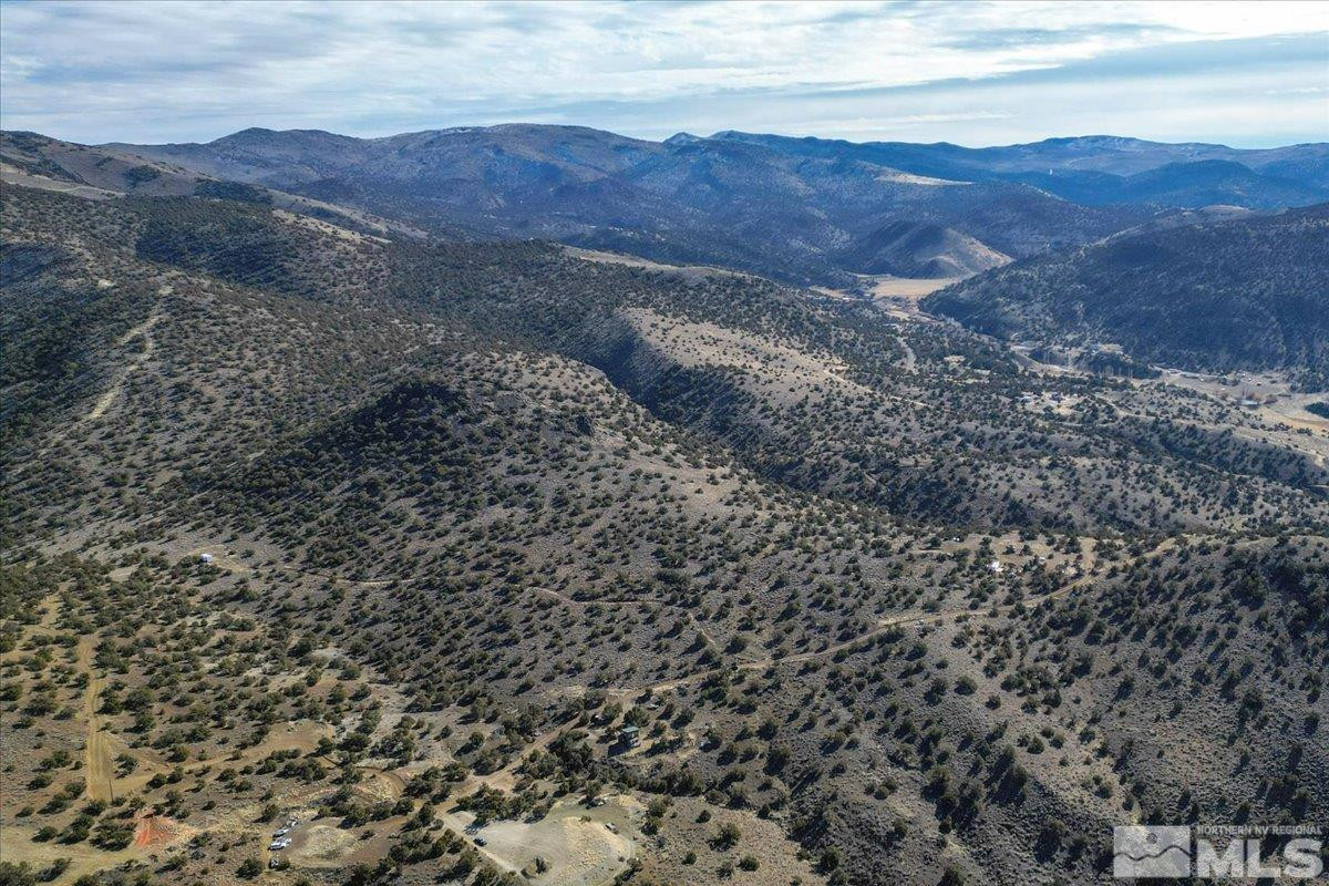 4 Ansari Lane, Unit 4 Reno, NV 89510 - Photo 13 of 22 a view of a dry field with mountains in the background