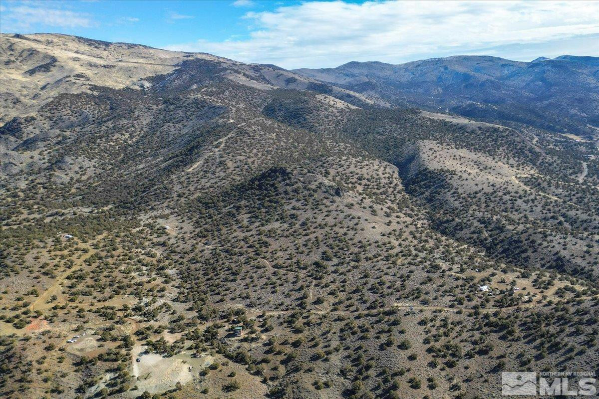 4 Ansari Lane, Unit 4 Reno, NV 89510 - Photo 15 of 22 a view of a dry yard with mountains in the background