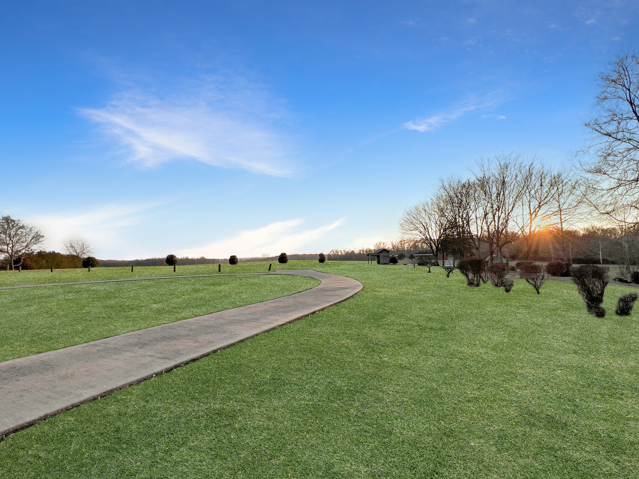 2982 Harvey Bowden Road Springville, TN 38256 - Photo 2 of 48 a view of a golf course with a garden