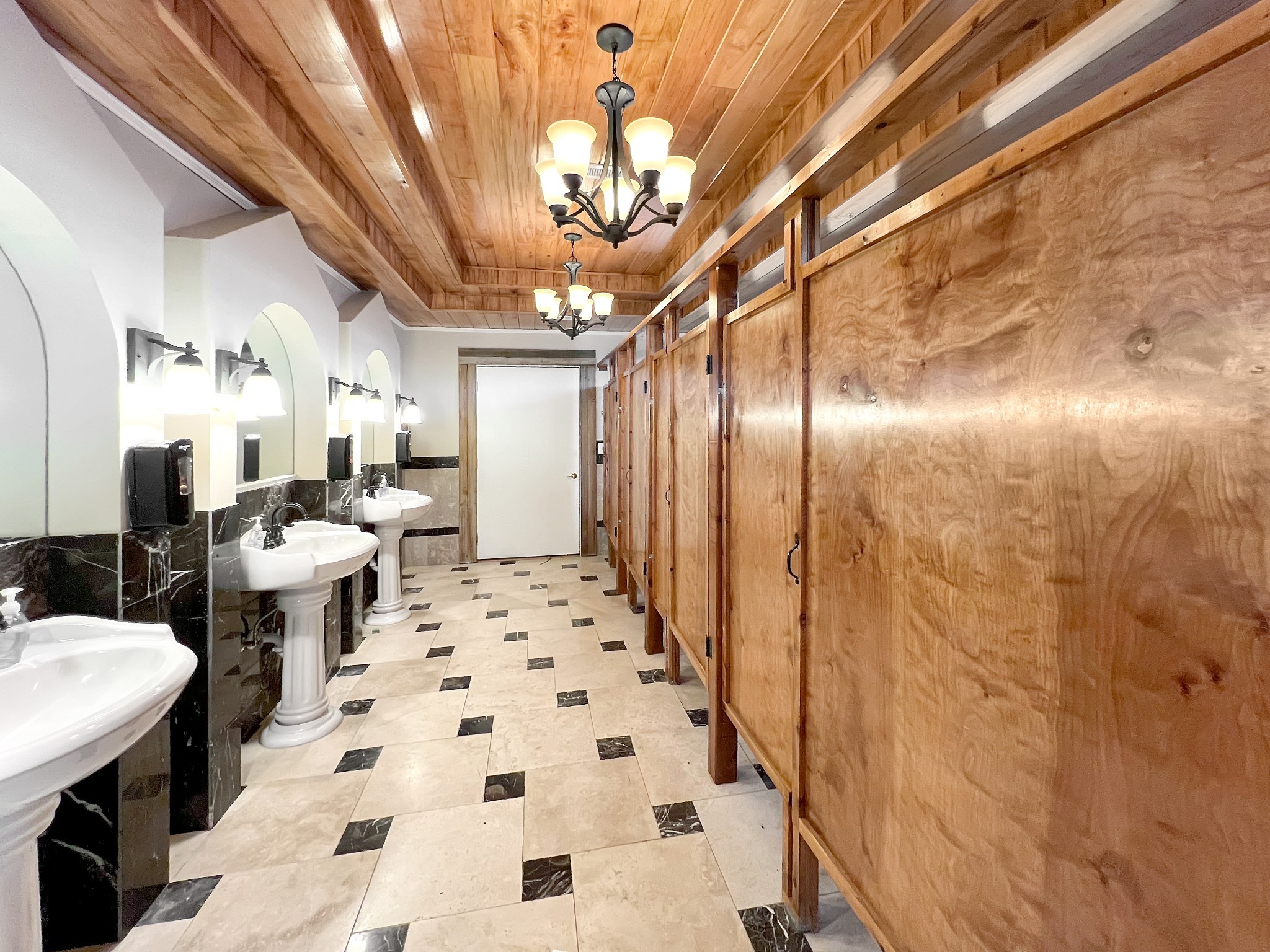 2982 Harvey Bowden Road Springville, TN 38256 - Photo 33 of 48 a very nice looking room with a large window and chandelier