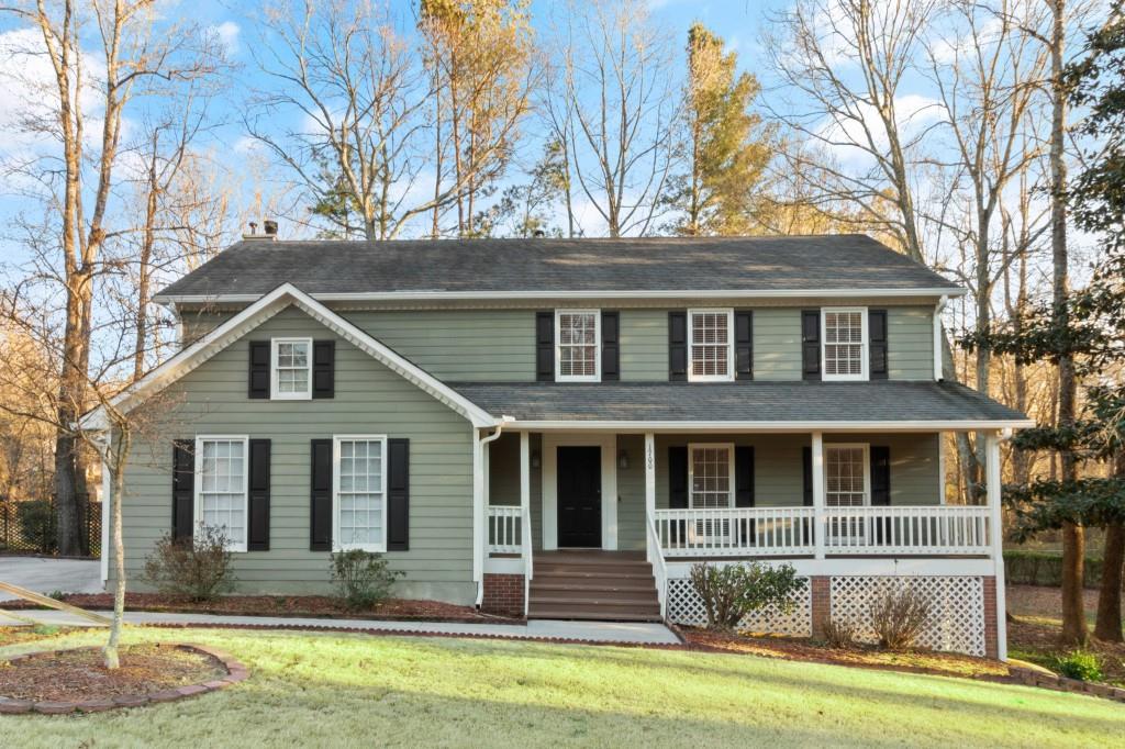1700 Summit View Way Snellville, GA 30078 - Photo 1 of 1 a front view of a house with a yard