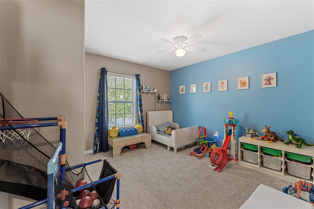 3523 Clay Brick Road St. Cloud, FL 34773 - Photo 20 of 62 a living room with furniture and a window