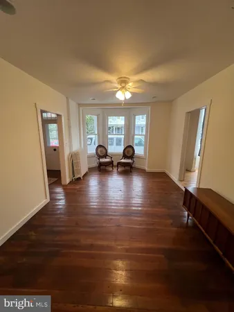 a view of a living room with furniture