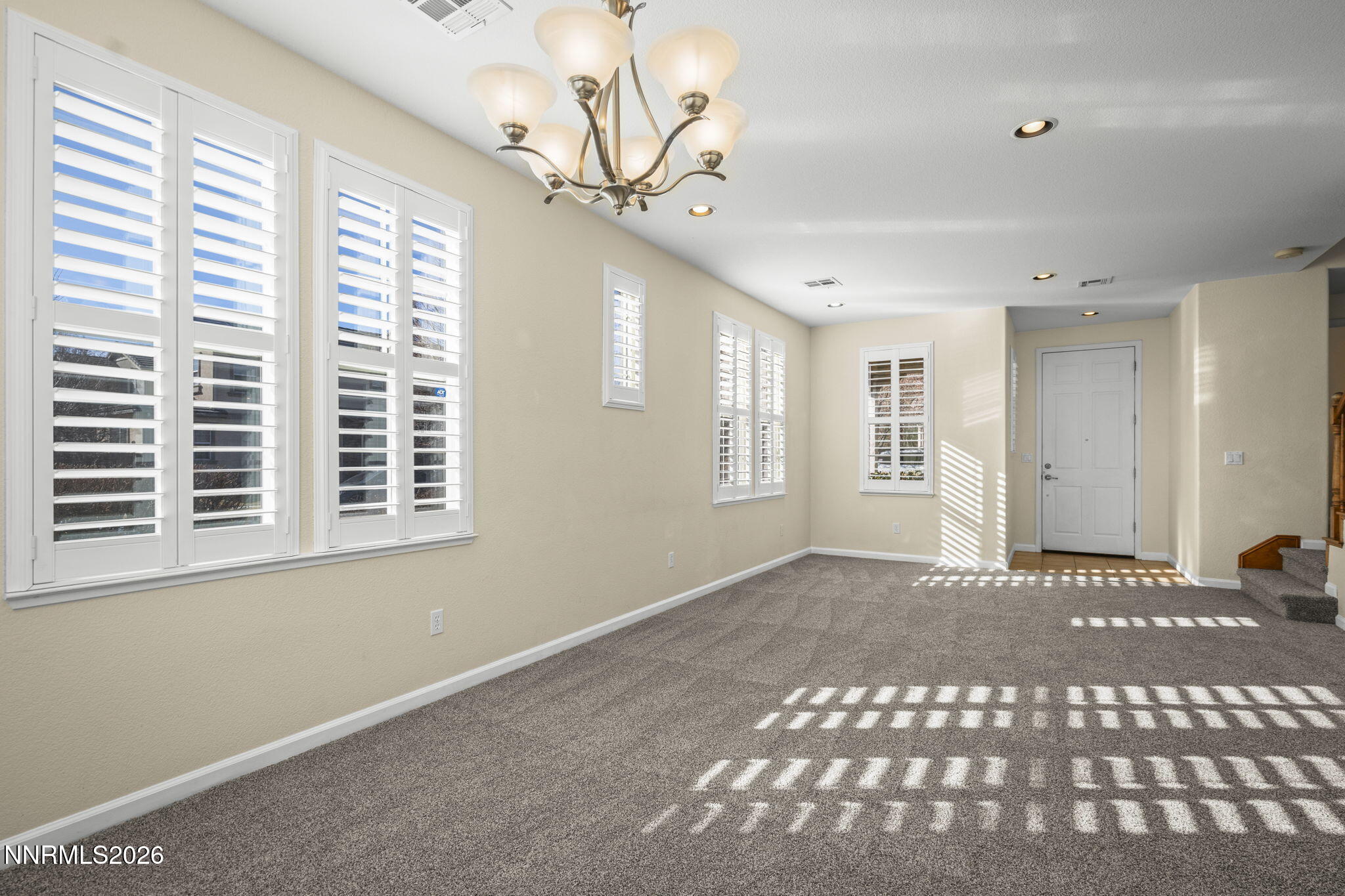 6953 Sacred Circle Sparks, NV 89436 - Photo 18 of 26 a view of an empty room with a window