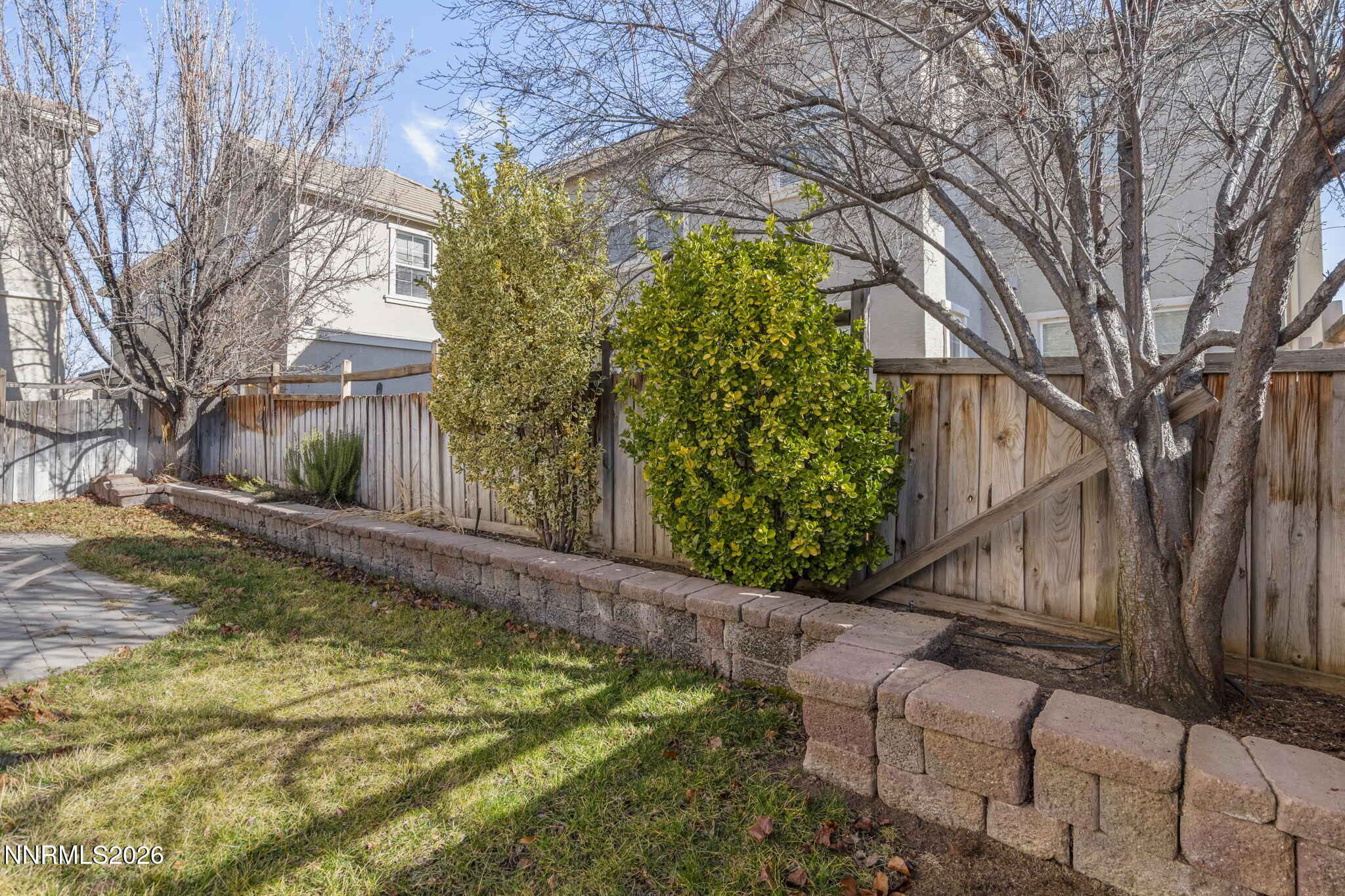 6953 Sacred Circle Sparks, NV 89436 - Photo 25 of 26 a view of a backyard