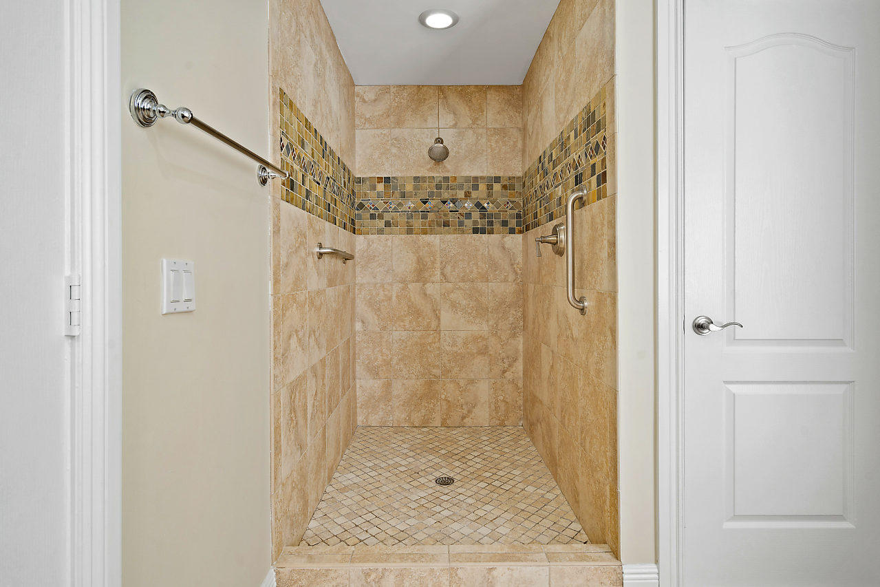 4572 White Cedar Lane Delray Beach, FL 33445 - Photo 18 of 37 a bathroom with a shower